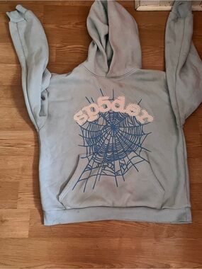 Unbranded Light Blue V-Neck Sweater with Graphic Web Design